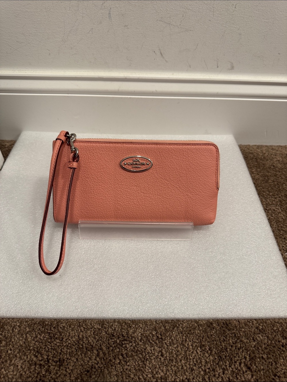 Coach pink Pebbled Leather Wristlet wallet
